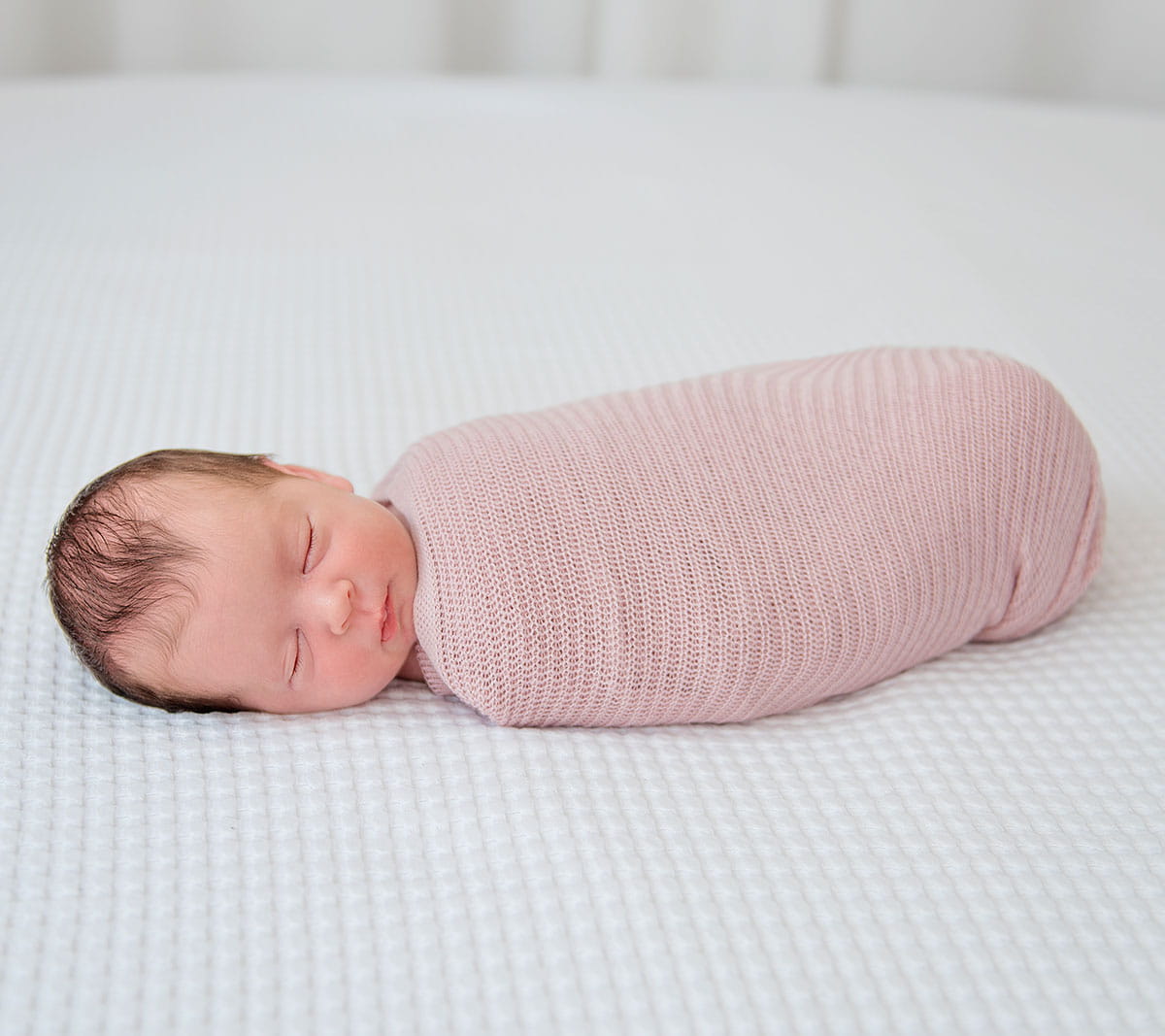 Light pink swaddle on sale blanket